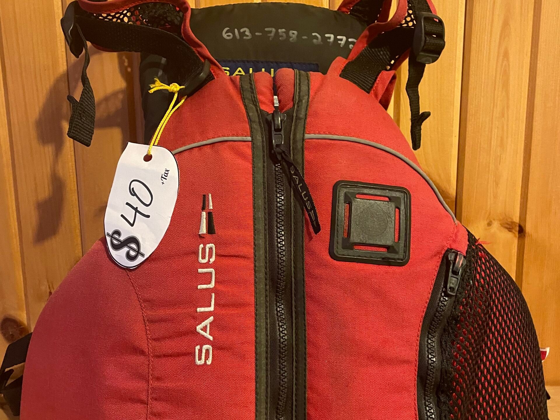 a bag of luggage sitting on top of a wooden table