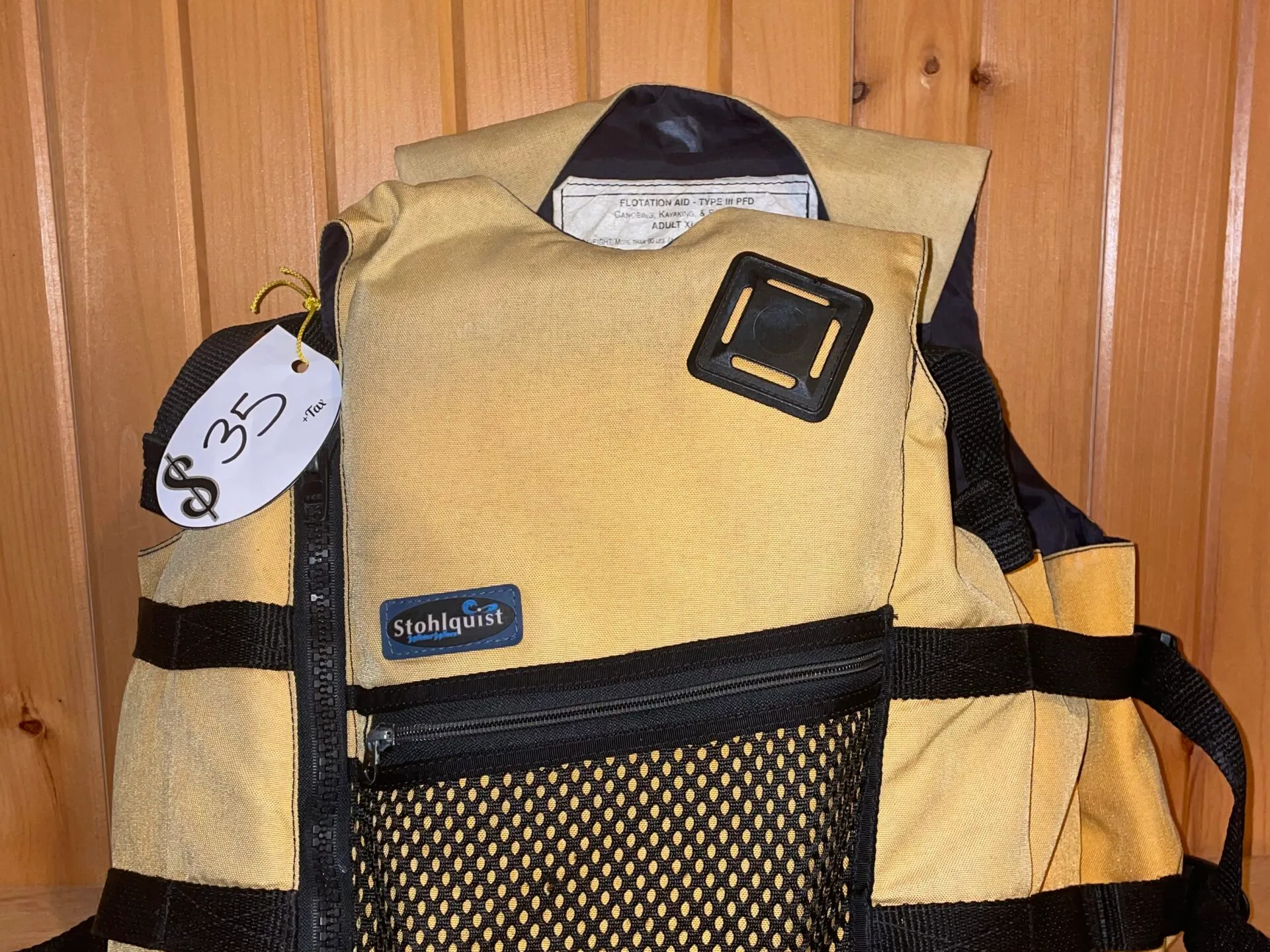 a bag of luggage sitting on top of a suitcase