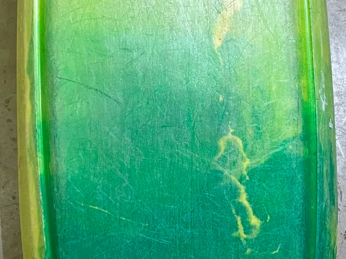 a close up of a green wall