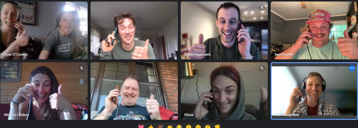 Nine people on a video call, smiling and giving thumbs up gestures.